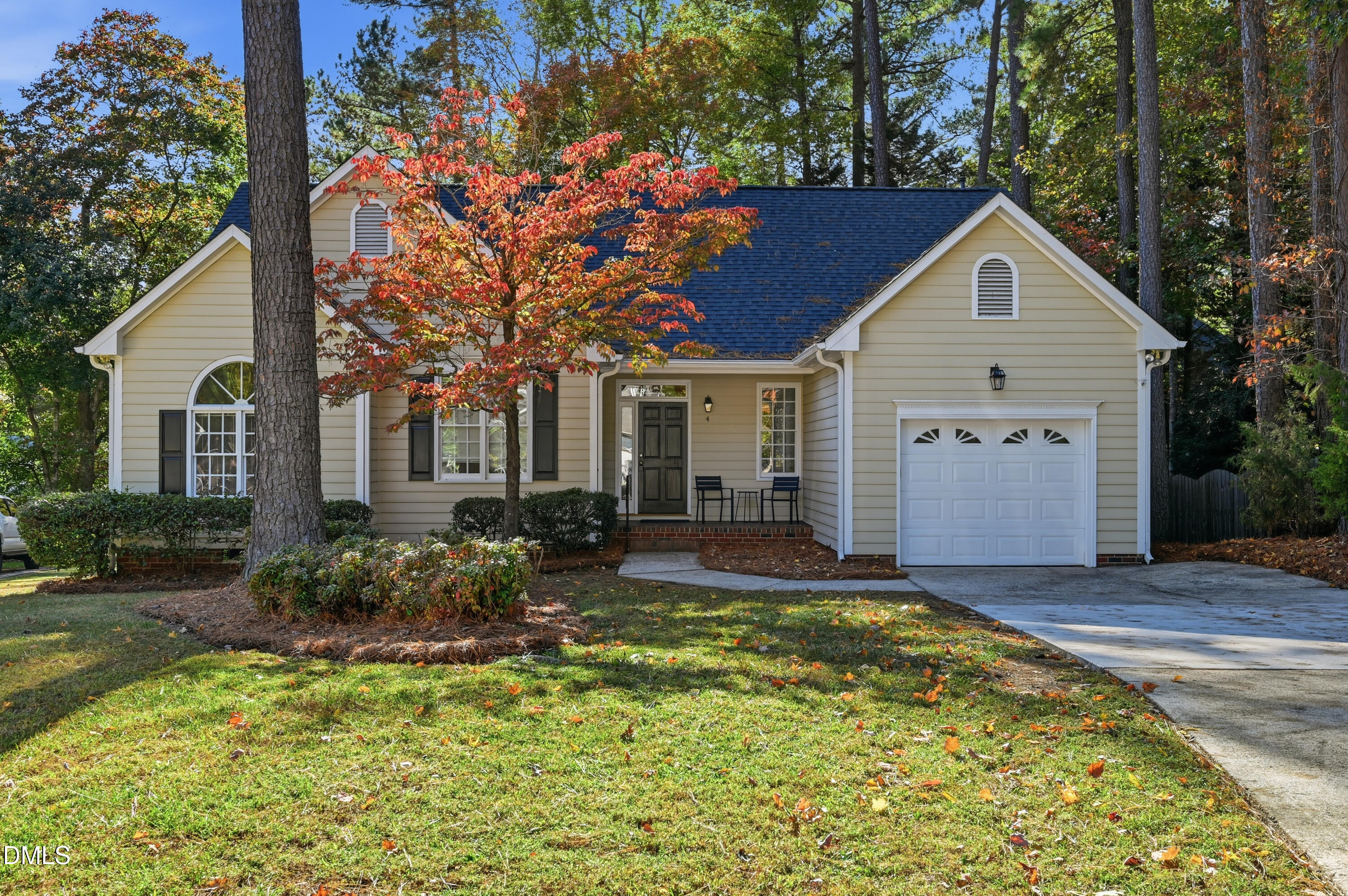 4 Wembley Court Durham, NC 27705 - Photo 3 of 41 a front view of a house with a yard and porch