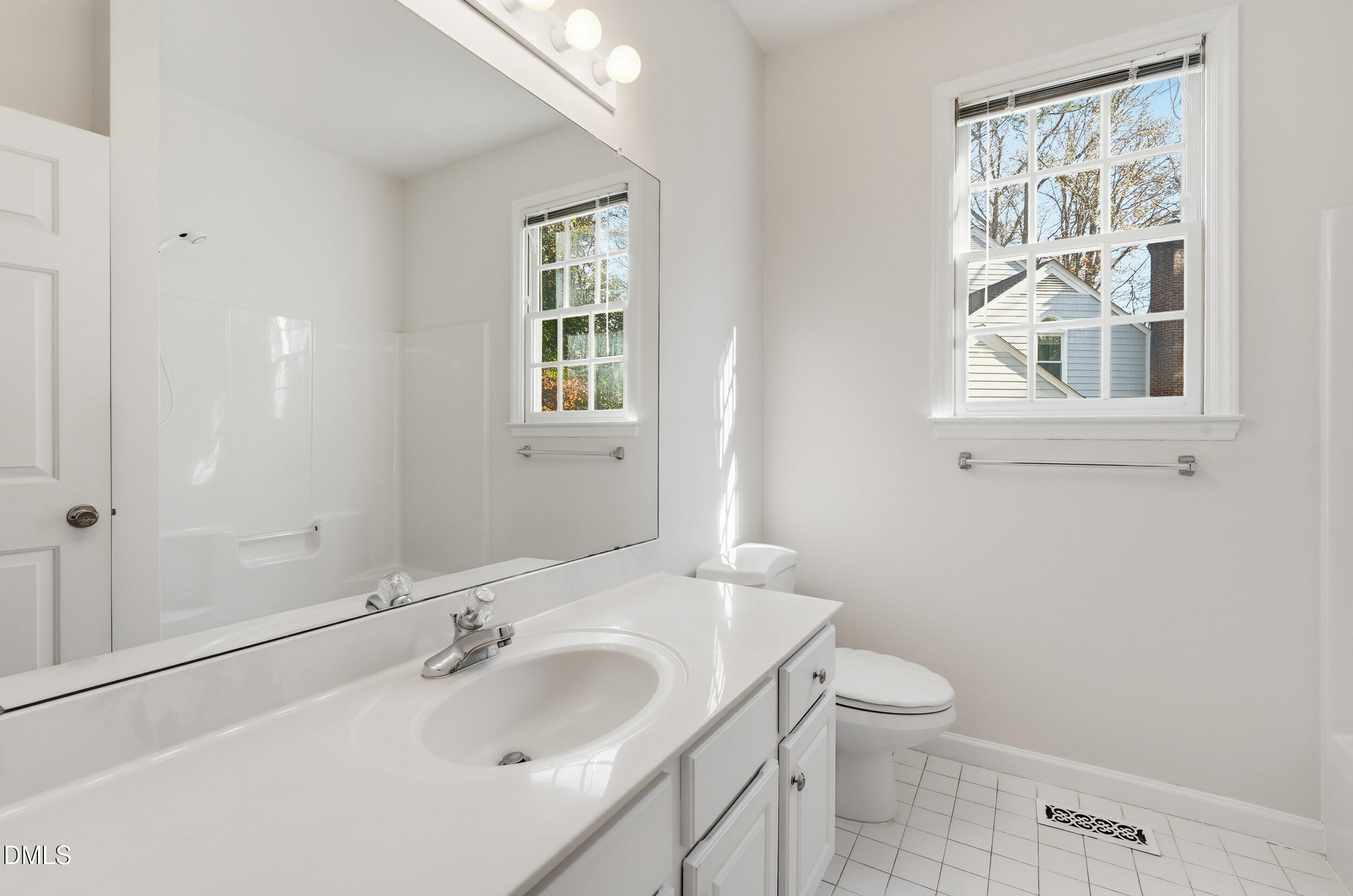 4 Wembley Court Durham, NC 27705 - Photo 33 of 41 a bathroom with a sink and a toilet
