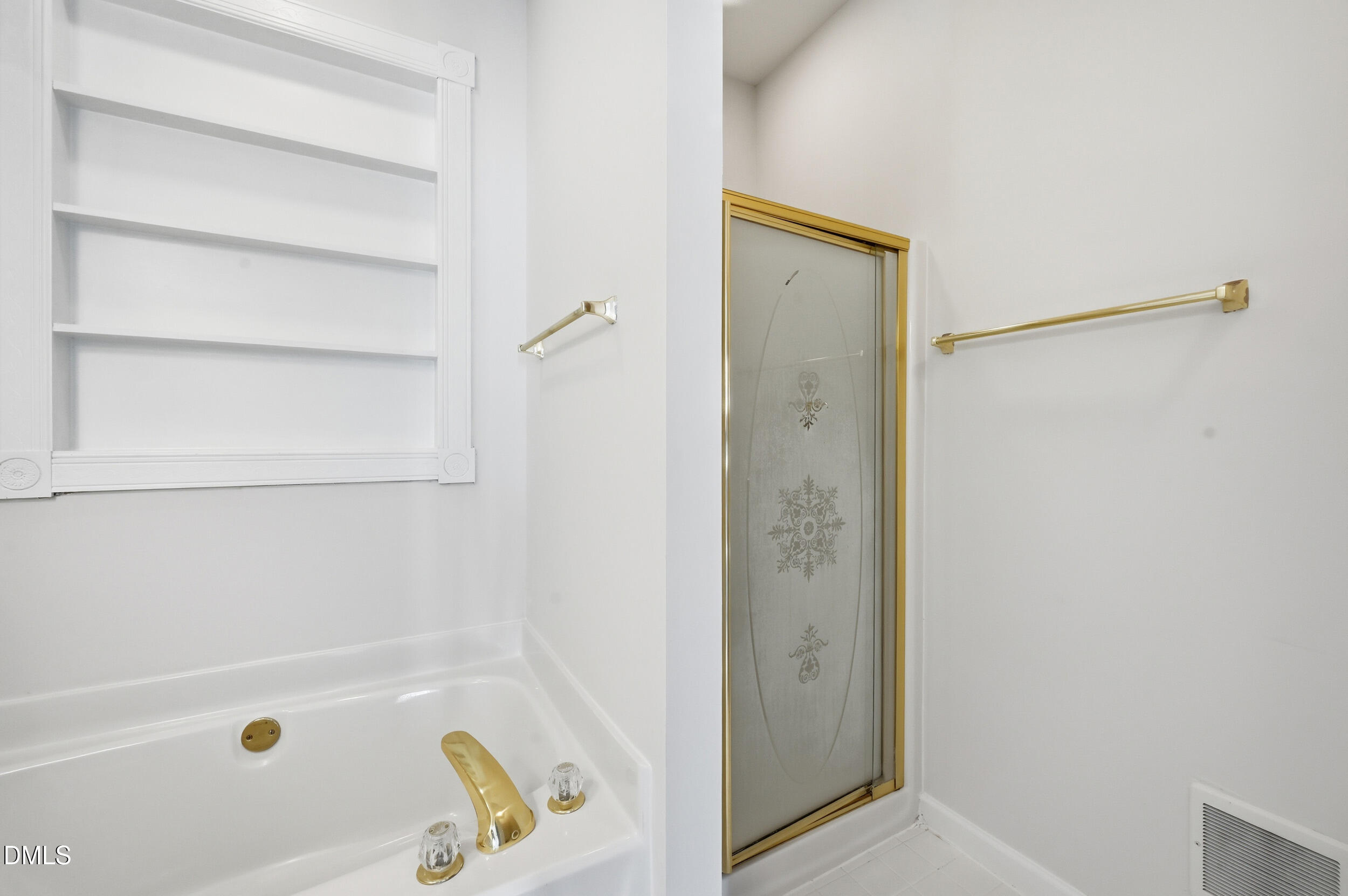 4 Wembley Court Durham, NC 27705 - Photo 38 of 41 a bathroom with a tub and shower