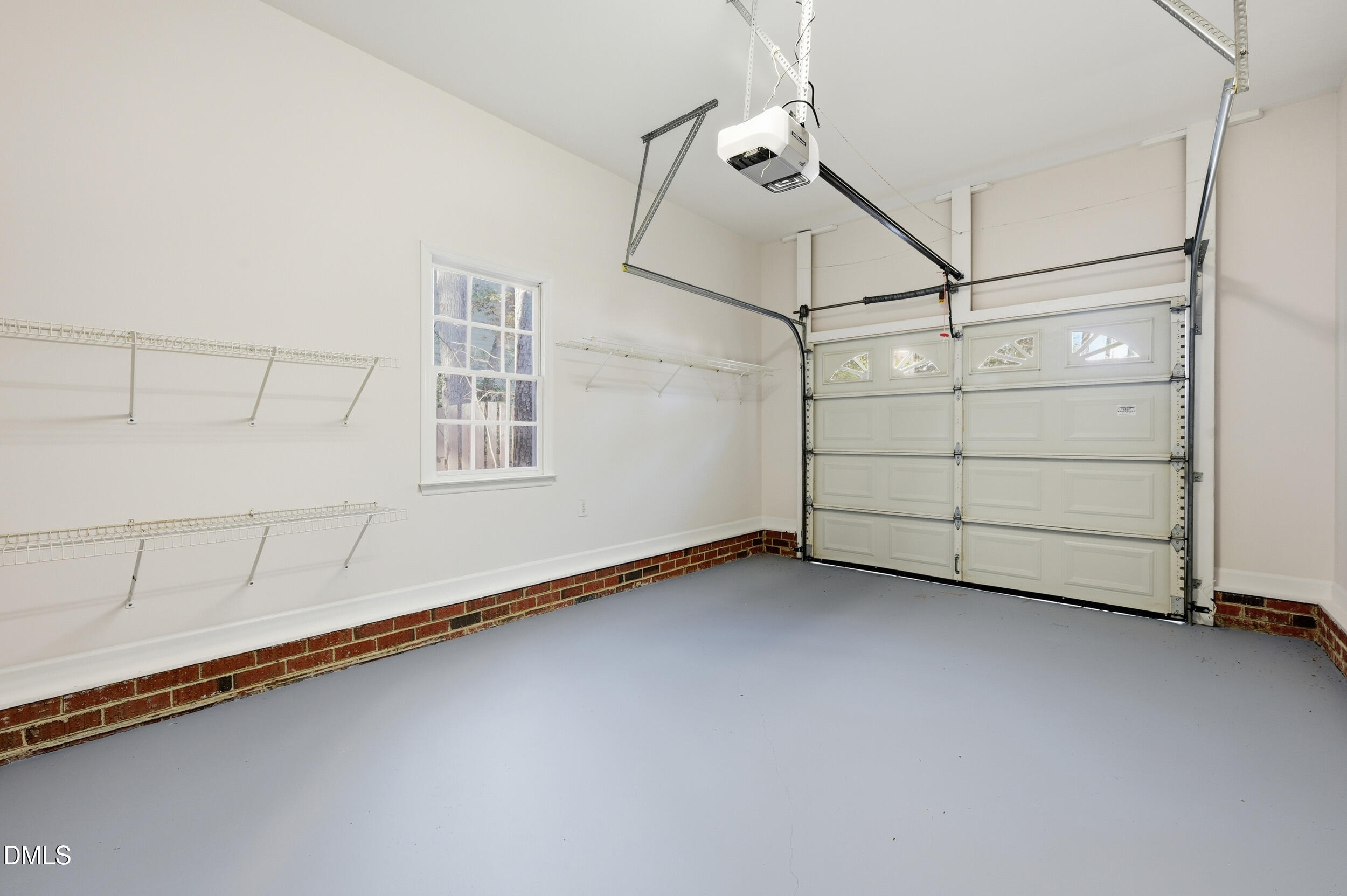 4 Wembley Court Durham, NC 27705 - Photo 40 of 41 a view of a room with racks on the wall