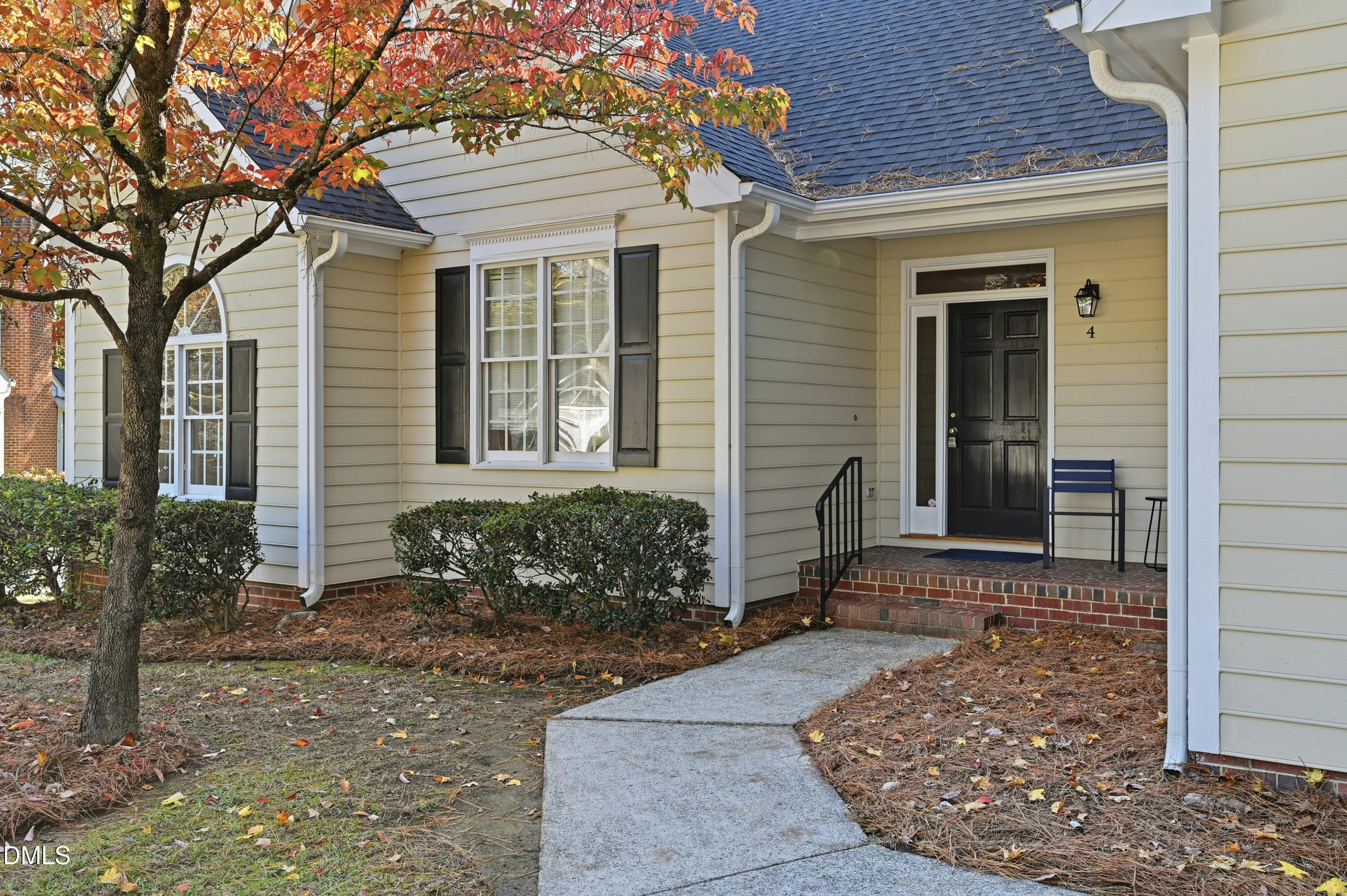 4 Wembley Court Durham, NC 27705 - Photo 4 of 41 a front view of a house with garden