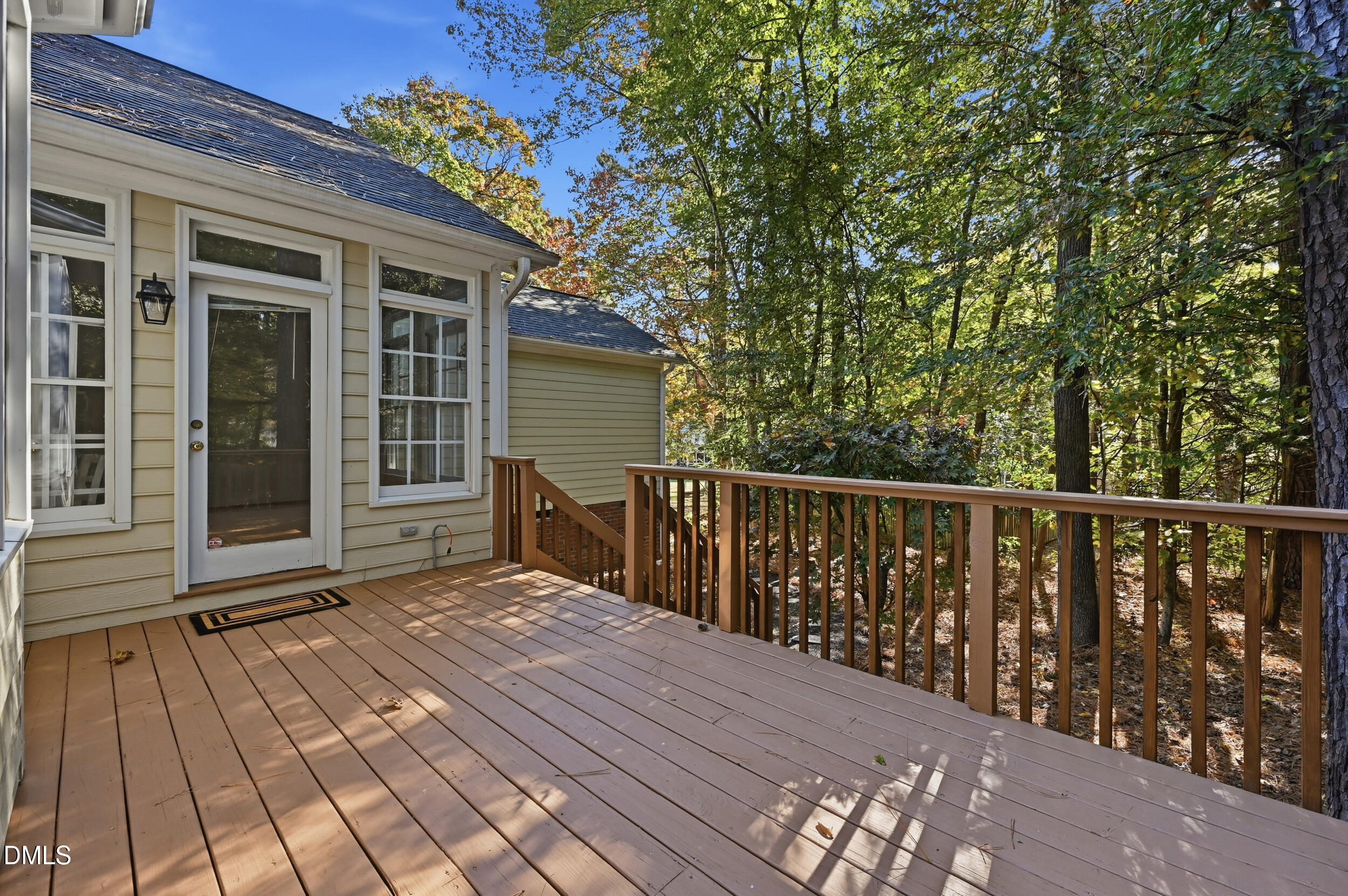 4 Wembley Court Durham, NC 27705 - Photo 8 of 41 a balcony with wooden floor and fence