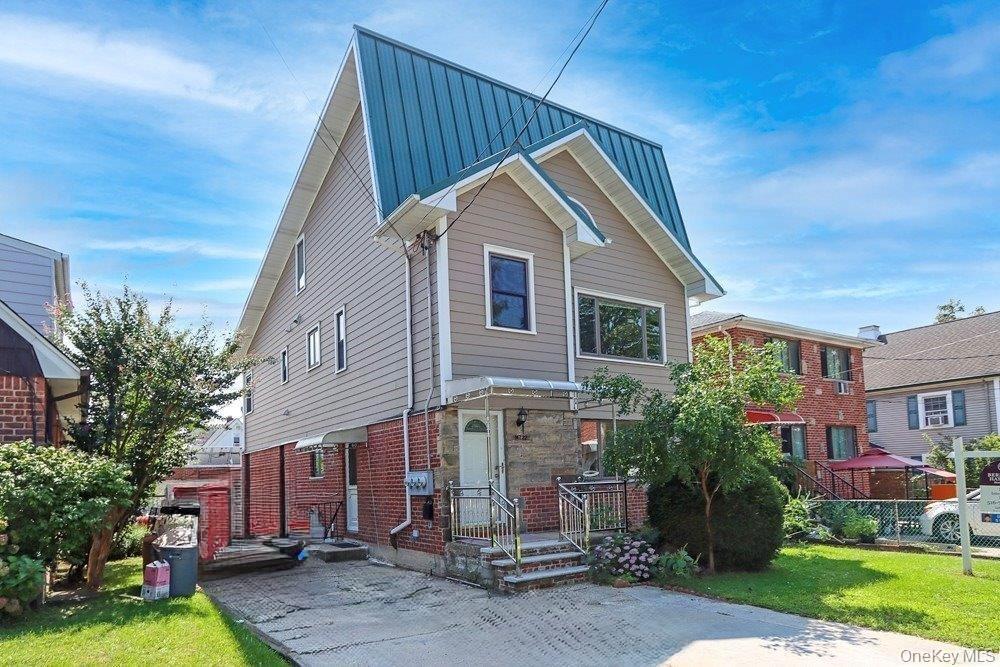 147-22 Ash Avenue Queens, NY 11355 - Photo 1 of 22 a view of house with yard and entertaining space