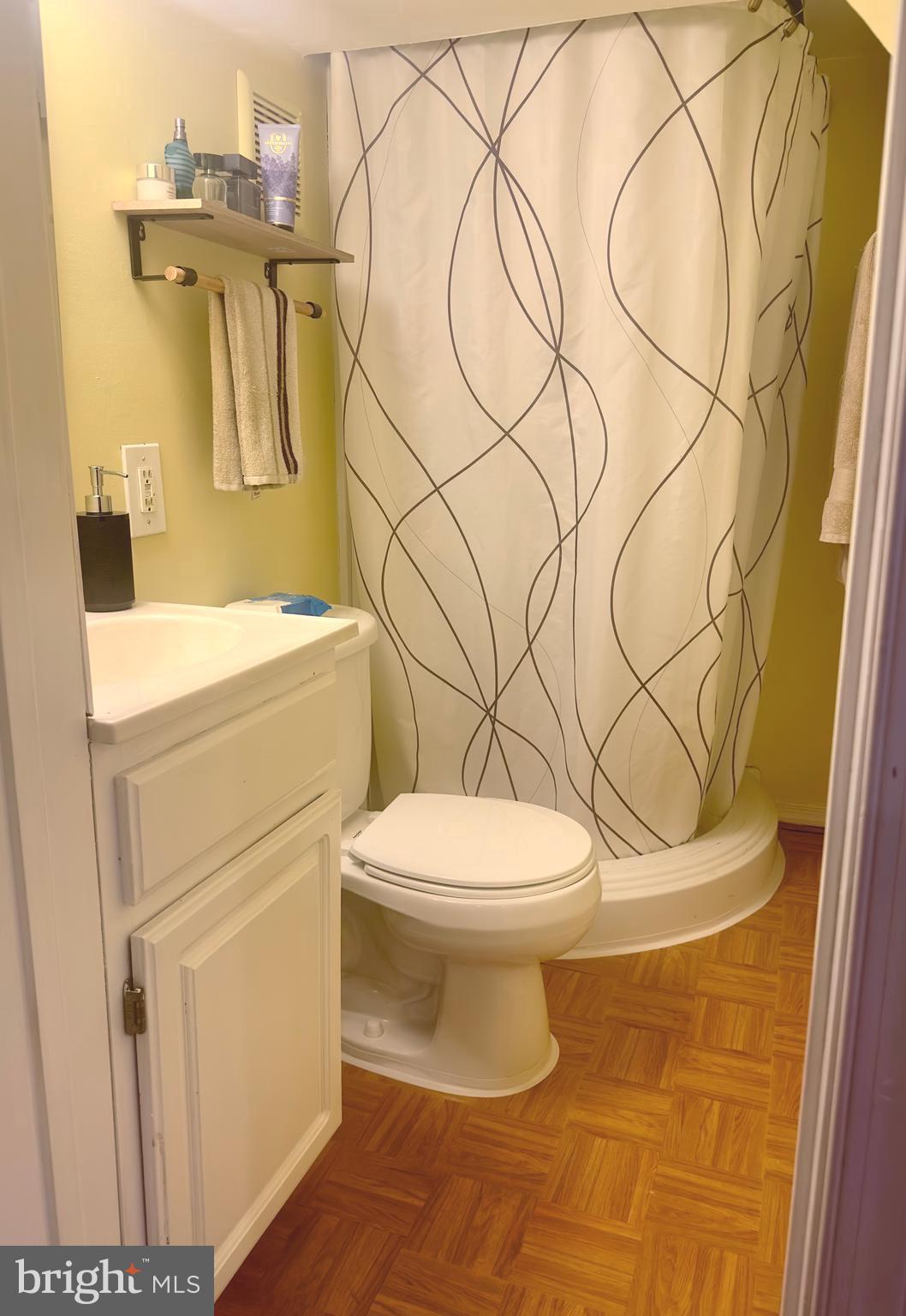 19829 Wheelwright Drive Gaithersburg, MD 20886 - Photo 27 of 35 a bathroom with a toilet and a sink