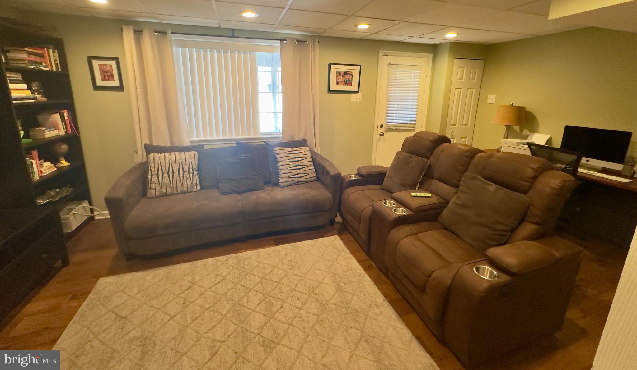 19829 Wheelwright Drive Gaithersburg, MD 20886 - Photo 28 of 35 a living room with furniture and a window