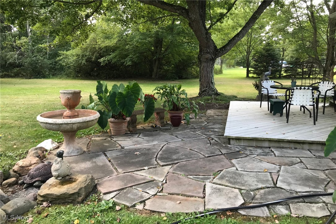 698 Albert Horning Road Atwater, OH 44201 - Photo 6 of 40 View of patio / terrace featuring outdoor dining space and a deck