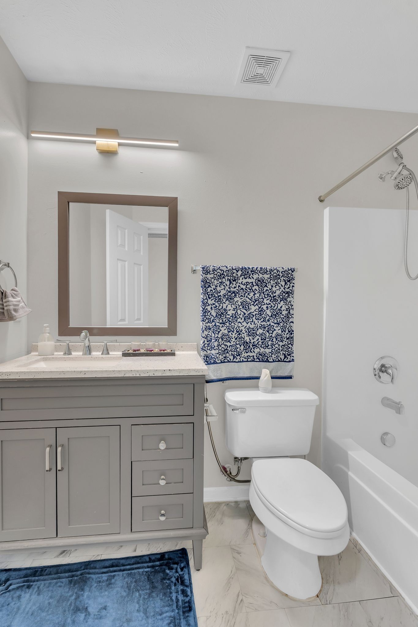 1792 Red Jacket Drive Antioch, TN 37013 - Photo 12 of 22 a bathroom with a toilet a sink a mirror a bathtub and vanity