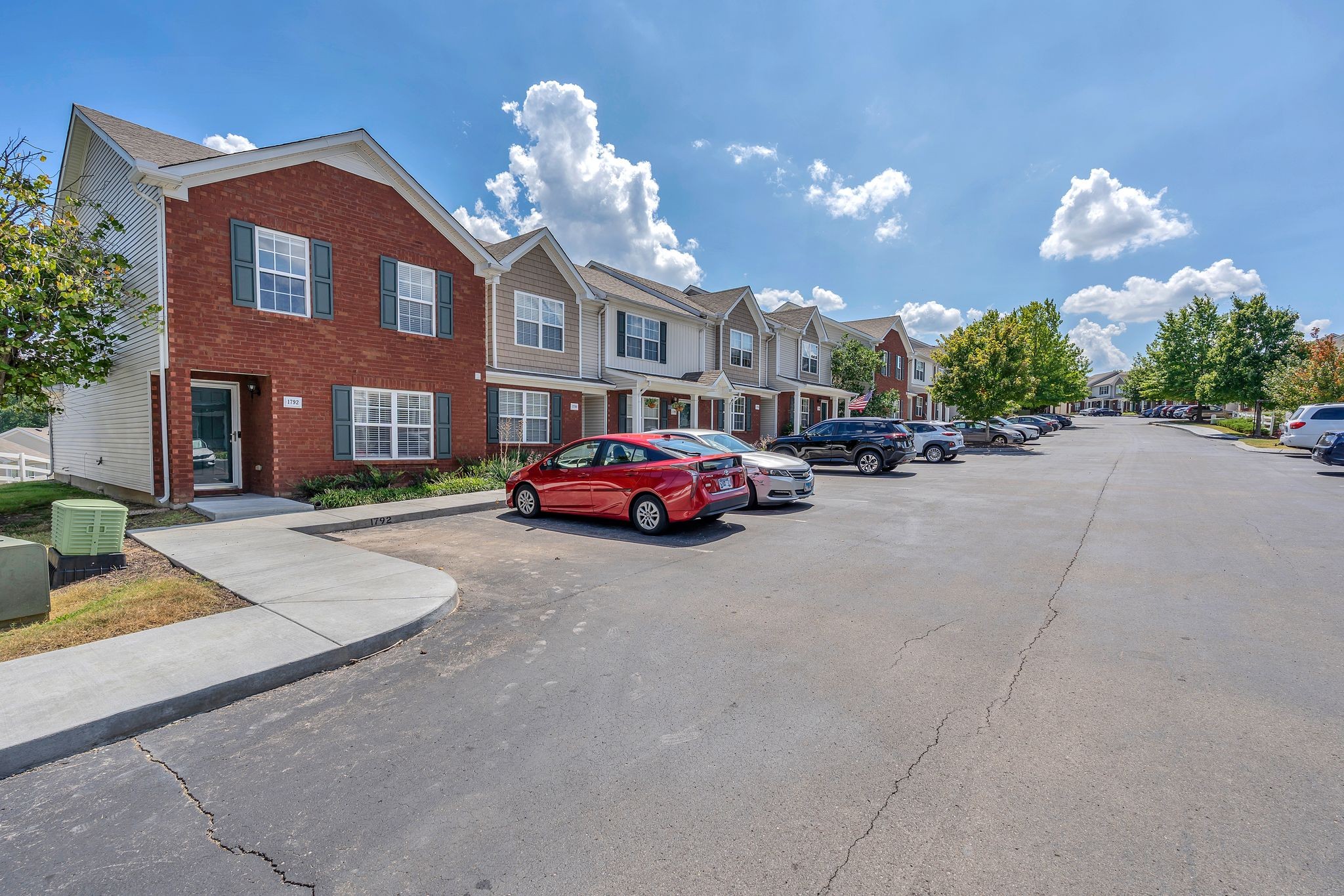 1792 Red Jacket Drive Antioch, TN 37013 - Photo 2 of 22 a cars parked in front of brick building