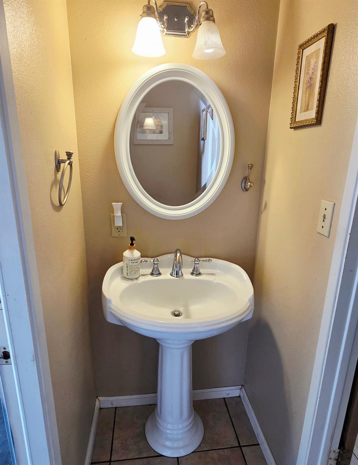 2214 Holt Avenue Sanger, CA 93657 - Photo 42 of 54 Powder room located off the laundry room