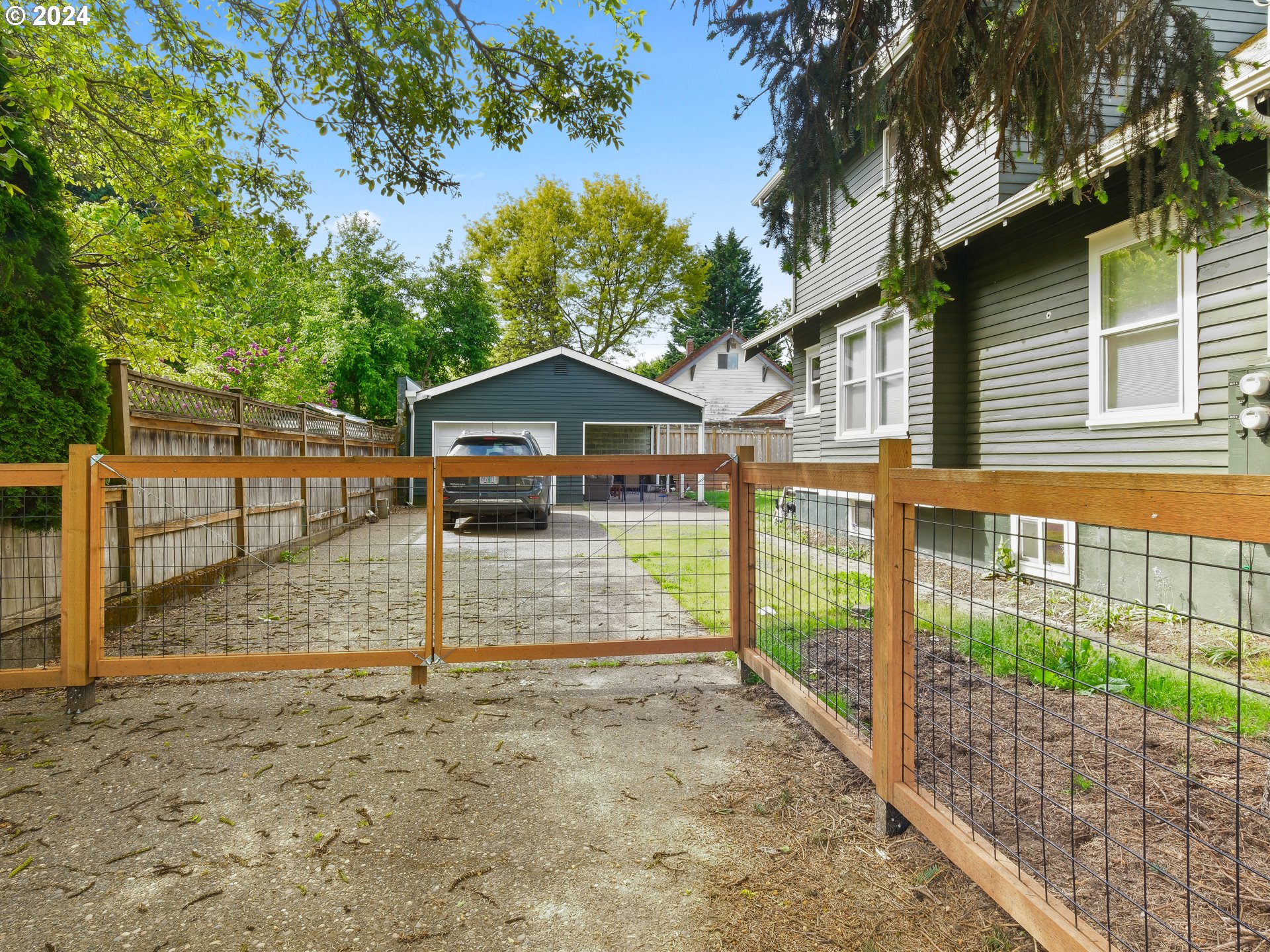 6676 North Mears Street Portland, OR 97203 - Photo 19 of 21 a view of a house with a yard