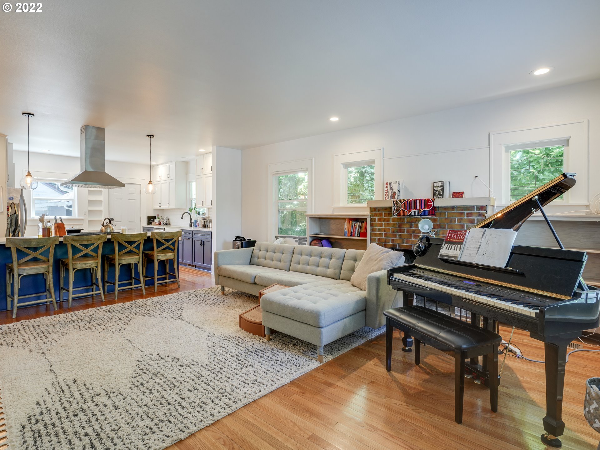 6676 North Mears Street Portland, OR 97203 - Photo 5 of 21 a living room with lots of furniture and a wooden floor