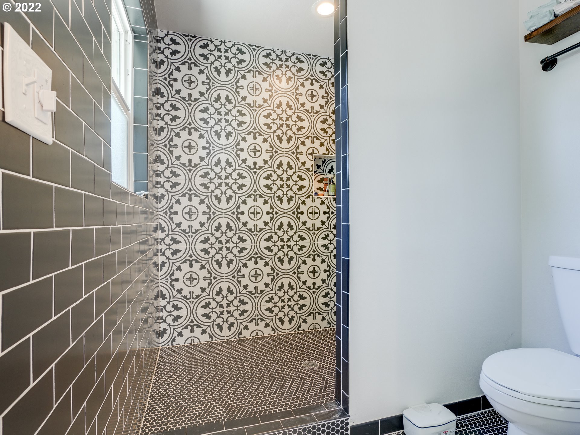 6676 North Mears Street Portland, OR 97203 - Photo 7 of 21 a bathroom with a toilet and a shower curtain