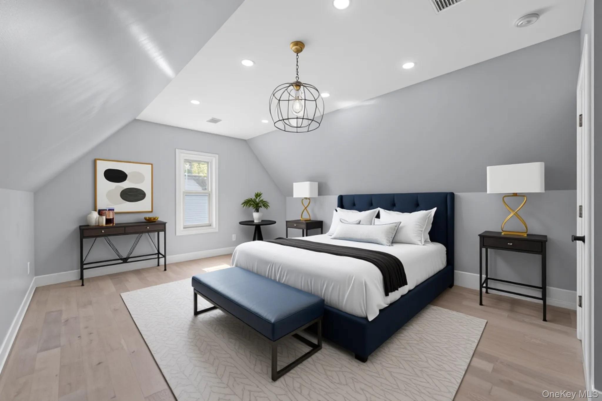 111-32 199th Street Queens, NY 11412 - Photo 12 of 19 Bedroom with light wood finished floors, vaulted ceiling, and recessed lighting