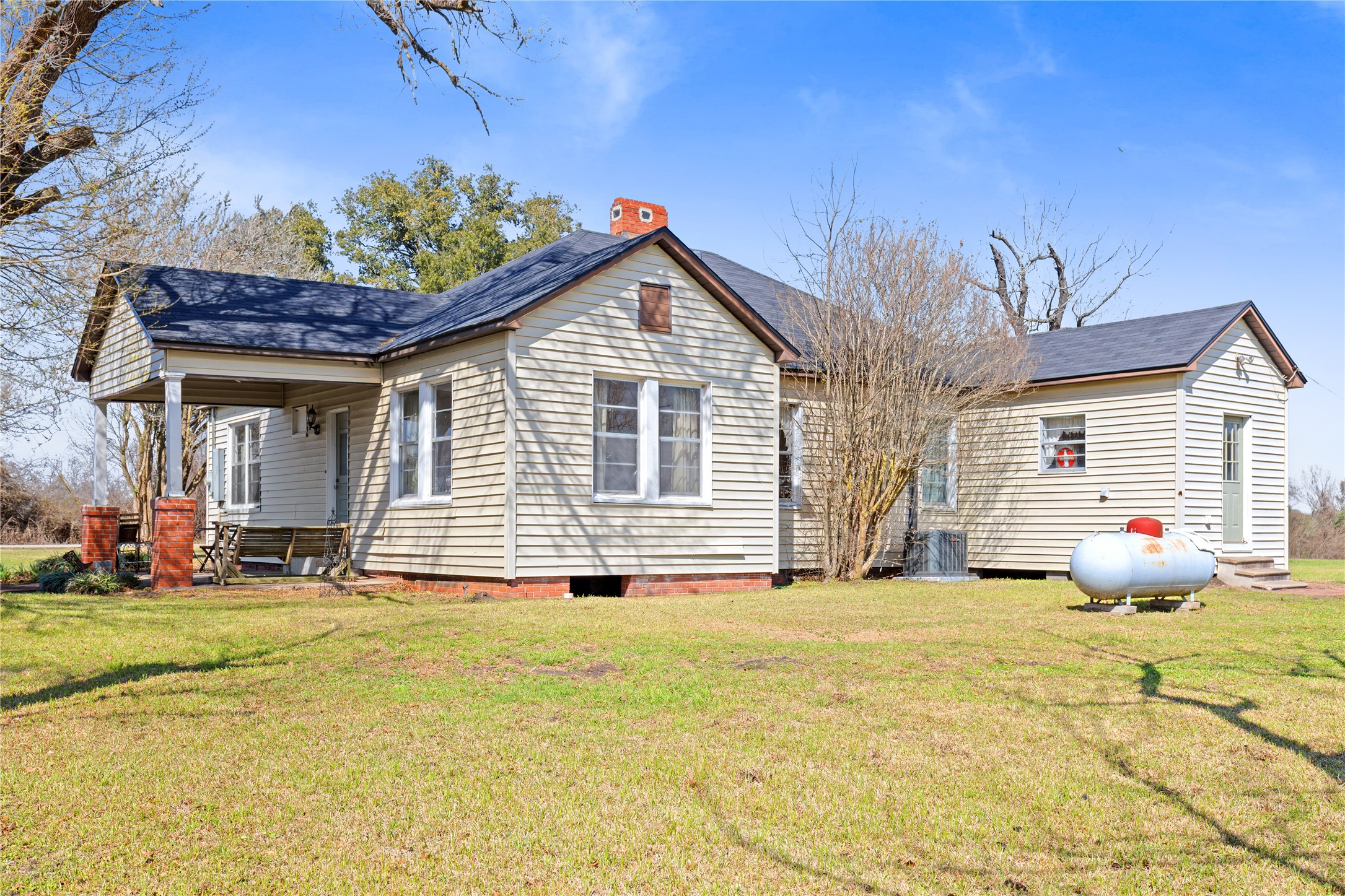 18218 Buck Road Washington, TX 77880 - Photo 23 of 32 a front view of a house with garden