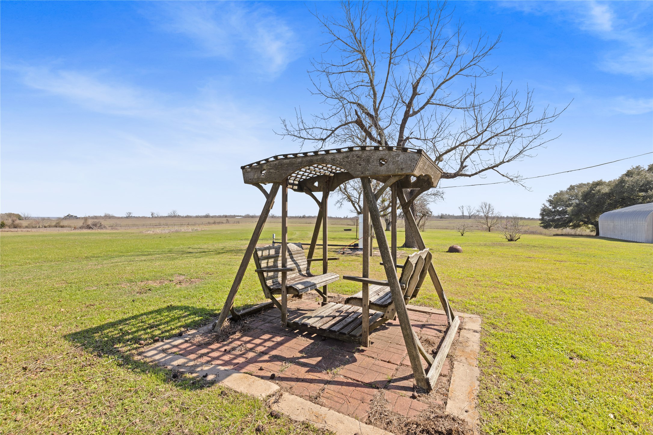 18218 Buck Road Washington, TX 77880 - Photo 26 of 32 a view of a yard with swimming pool