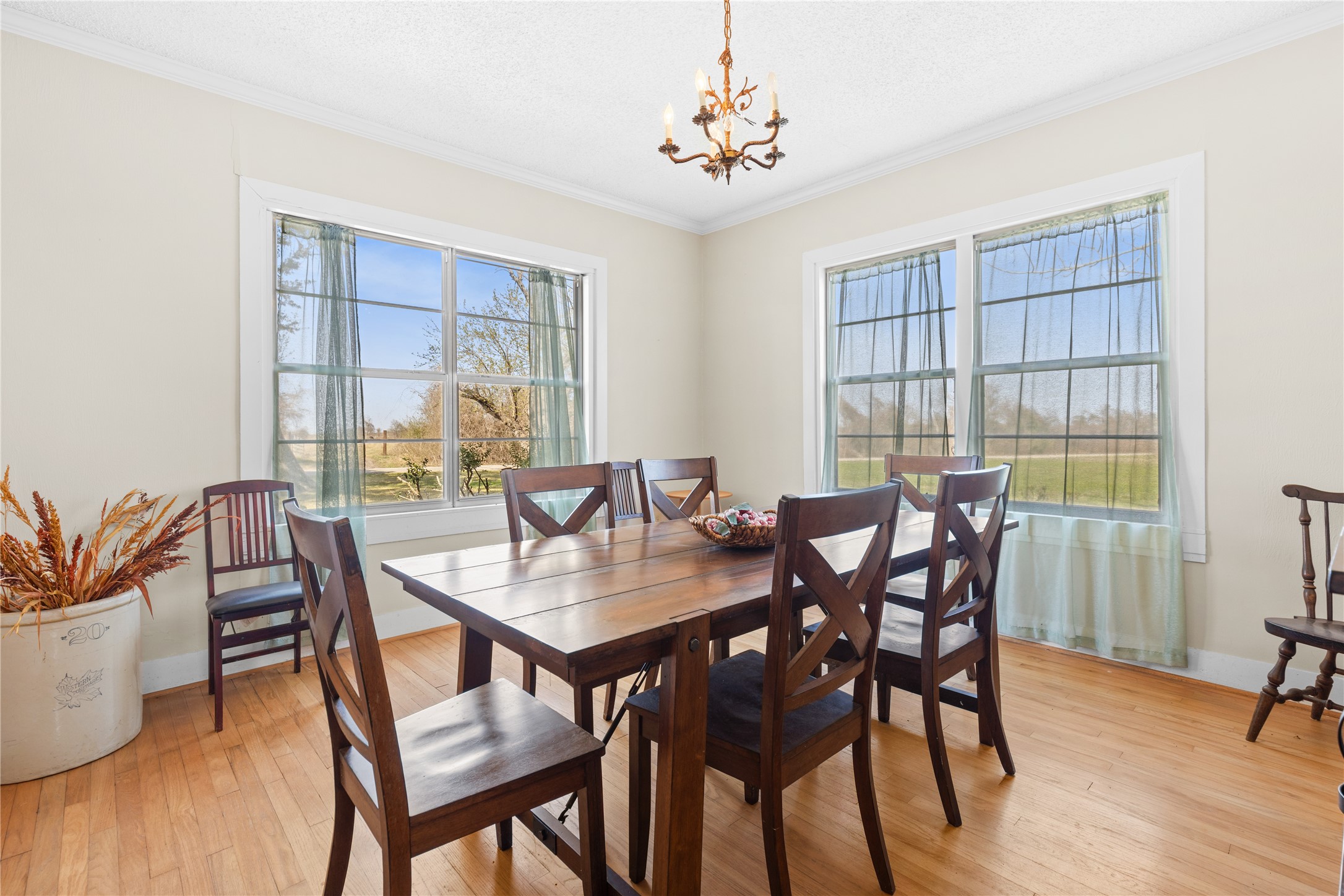 18218 Buck Road Washington, TX 77880 - Photo 8 of 32 a view of a dining room with furniture window and wooden floor
