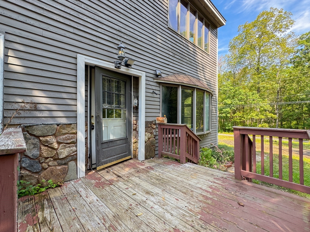 198 Union Road Wales, MA 01081 - Photo 12 of 42 a front view of a house with a porch