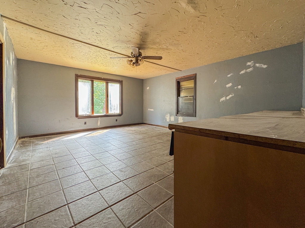 198 Union Road Wales, MA 01081 - Photo 15 of 42 a view of an empty room and window