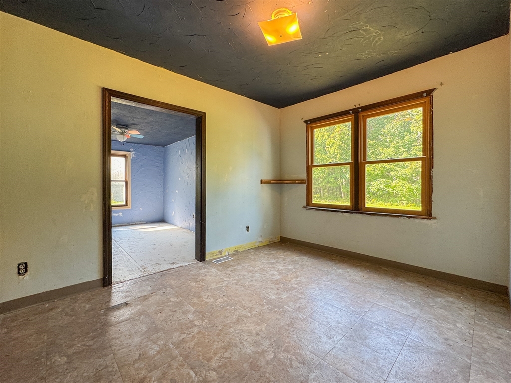 198 Union Road Wales, MA 01081 - Photo 17 of 42 a view of an empty room with a window