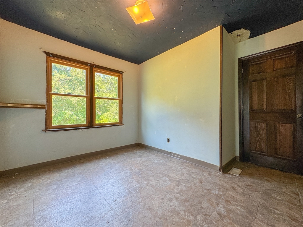 198 Union Road Wales, MA 01081 - Photo 19 of 42 an empty room with windows