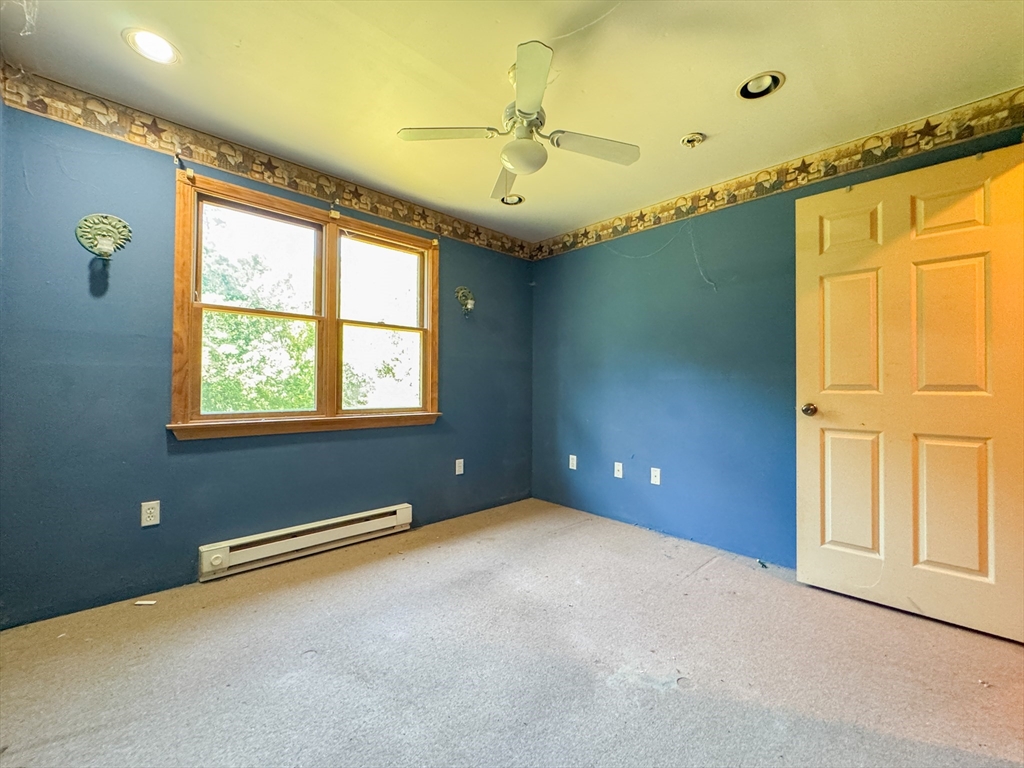 198 Union Road Wales, MA 01081 - Photo 34 of 42 a view of an empty room with a window