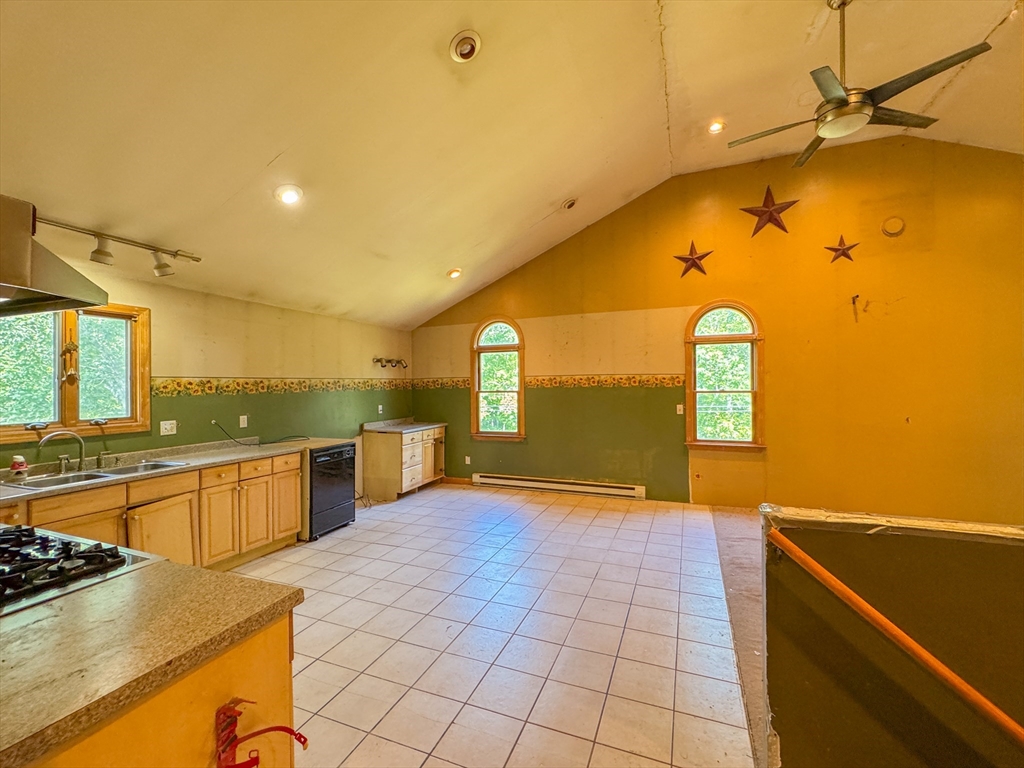 198 Union Road Wales, MA 01081 - Photo 38 of 42 a view of a kitchen with a sink and cabinets