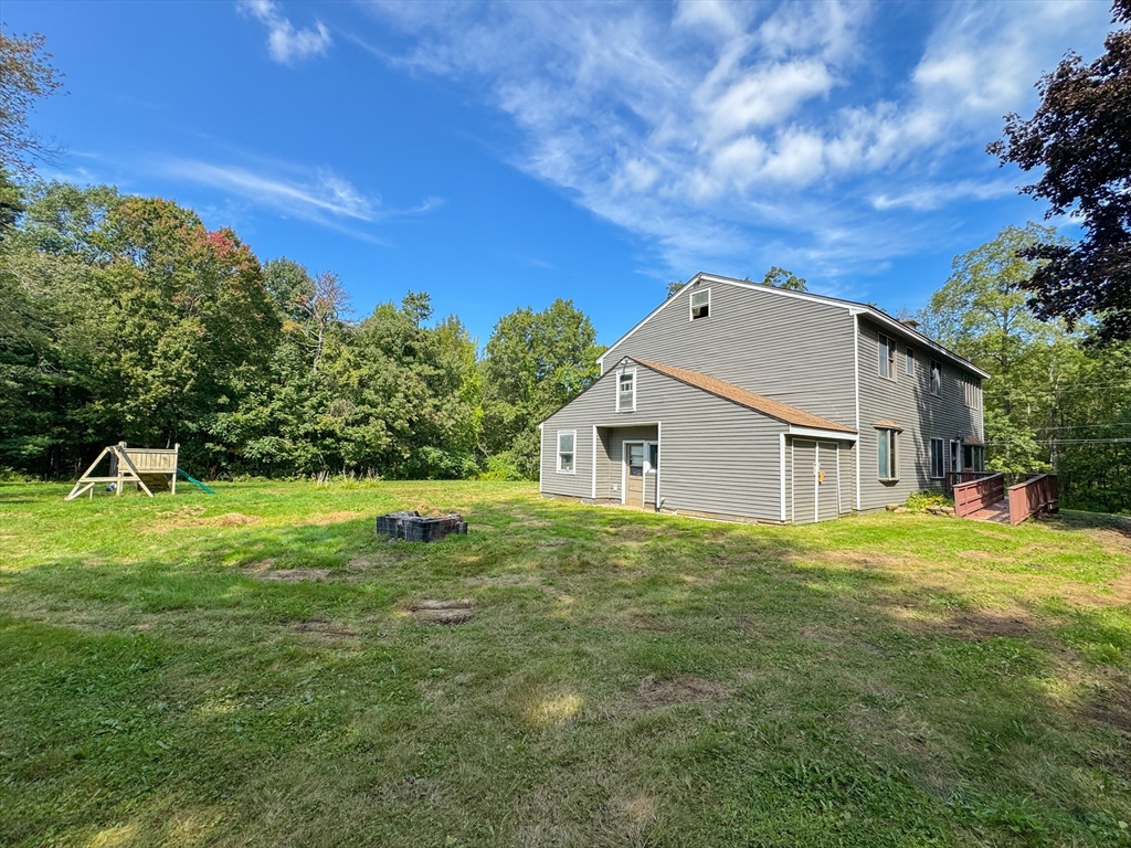 198 Union Road Wales, MA 01081 - Photo 5 of 42 a house view with a garden space