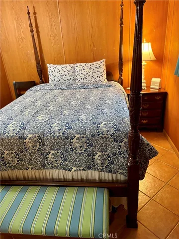 a living room with a couch and a window