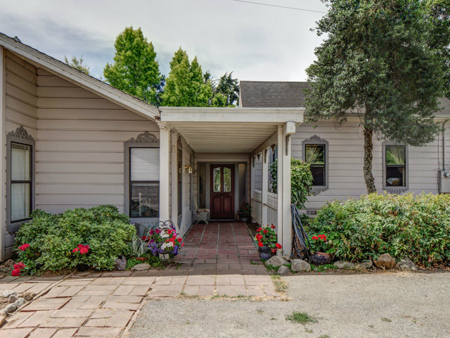 Undisclosed Address Soquel, CA 95073 - Photo 13 of 25 a view of a house with flower garden