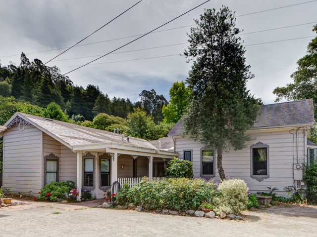 Undisclosed Address Soquel, CA 95073 - Photo 14 of 25 a front view of a house with plants and trees