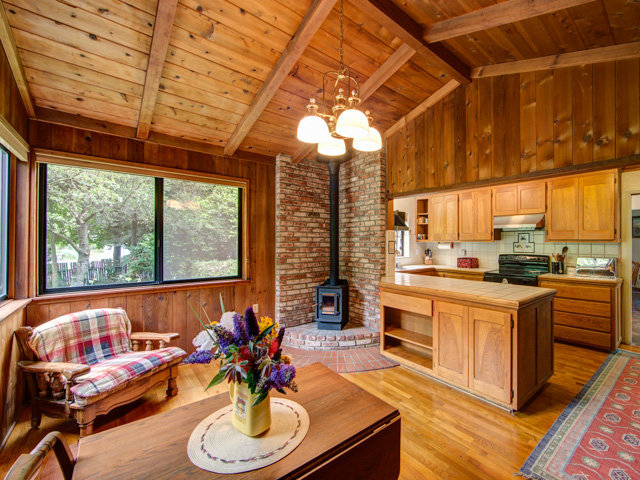 Undisclosed Address Soquel, CA 95073 - Photo 18 of 25 a kitchen with stainless steel appliances granite countertop a sink a stove and a wooden floors