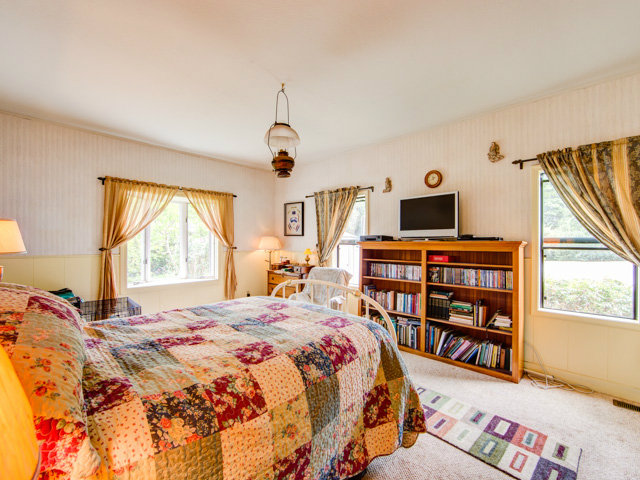 Undisclosed Address Soquel, CA 95073 - Photo 22 of 25 a bedroom with a bed and a book shelf