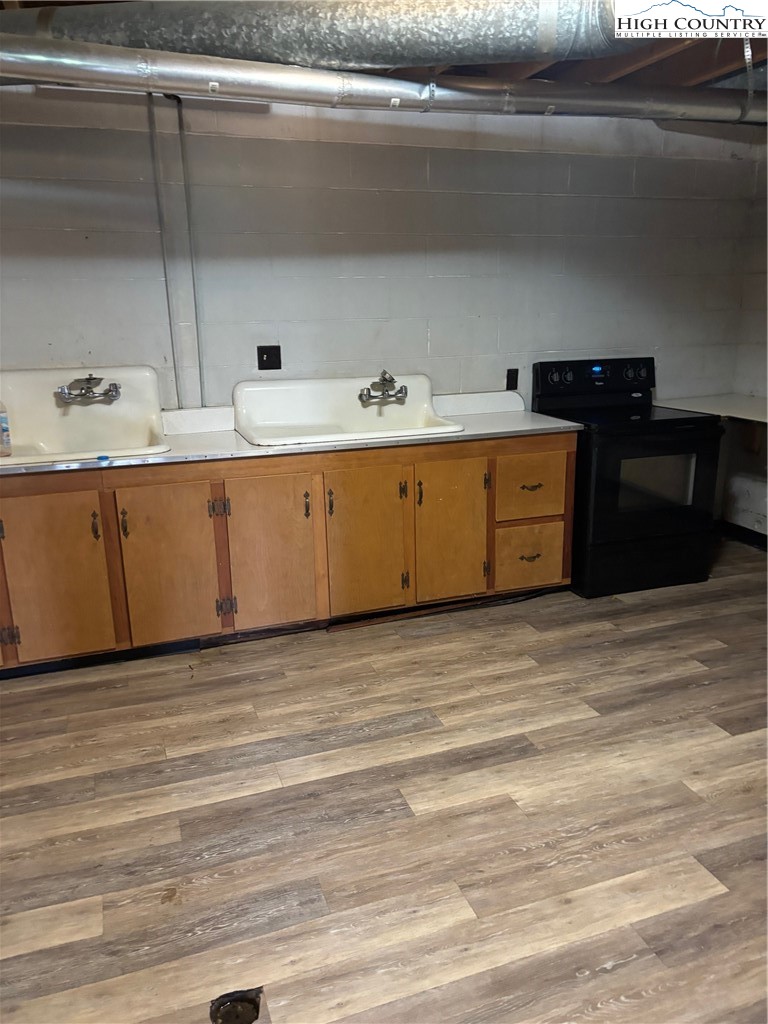 94 Kemp Street Sparta, NC 28675 - Photo 18 of 27 a view of a kitchen with cabinets