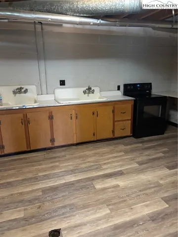 a view of a kitchen with cabinets