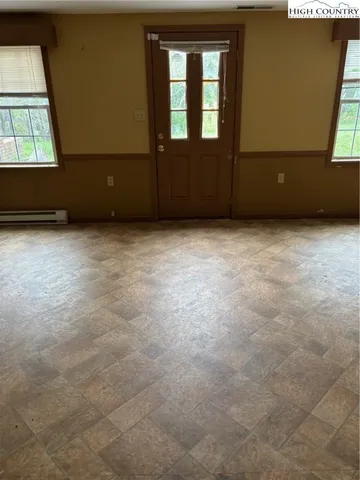 an empty room with windows