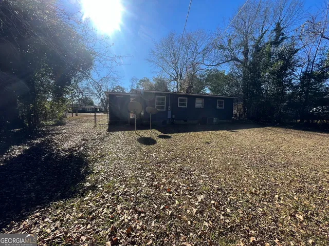 a view of outdoor space and yard