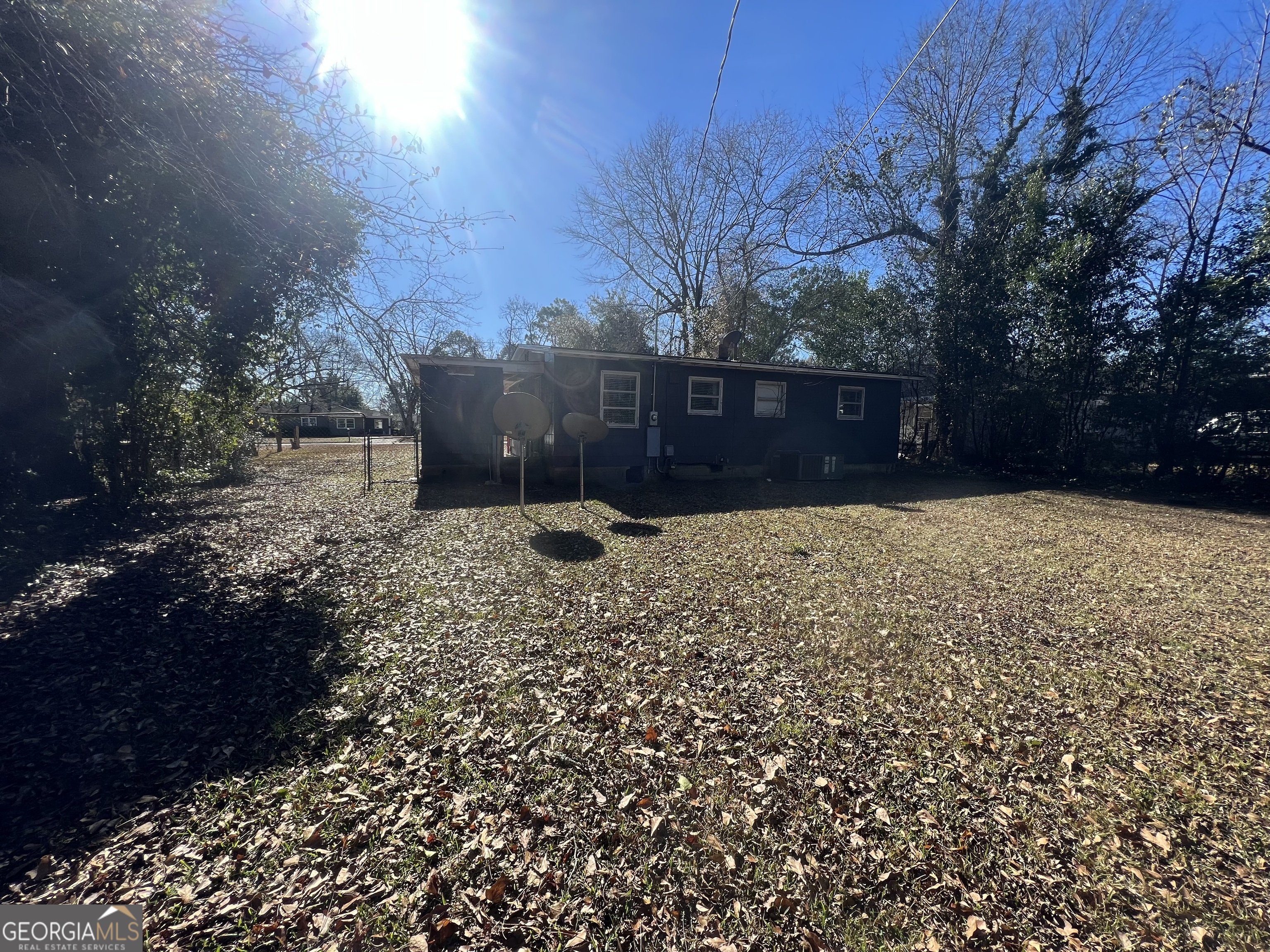 1909 West Broad Avenue Albany, GA 31707 - Photo 8 of 9 a swimming pool with a yard