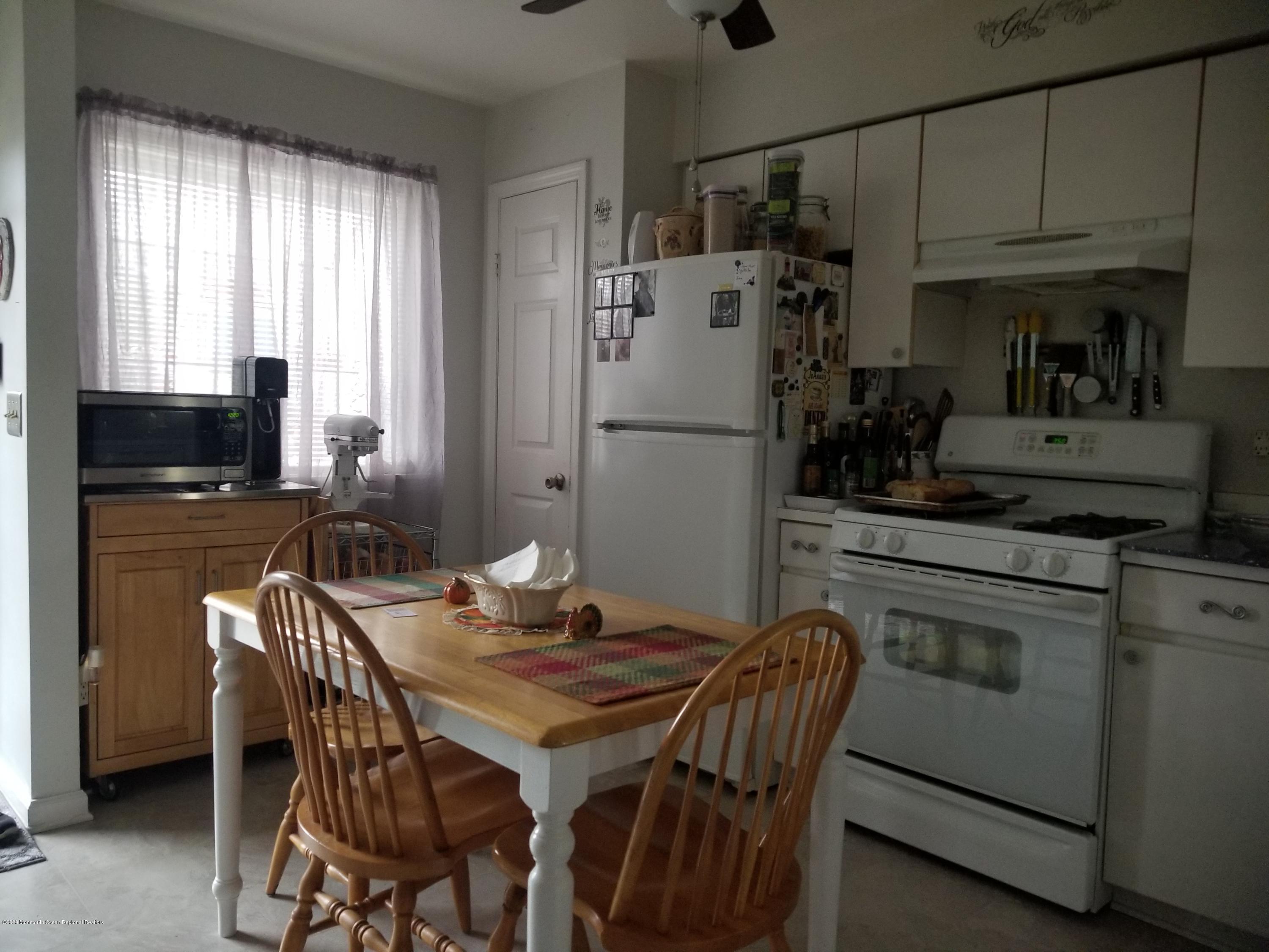 10 Gull Way Keyport, NJ 07735 - Photo 5 of 40 Pantry next to the fridge