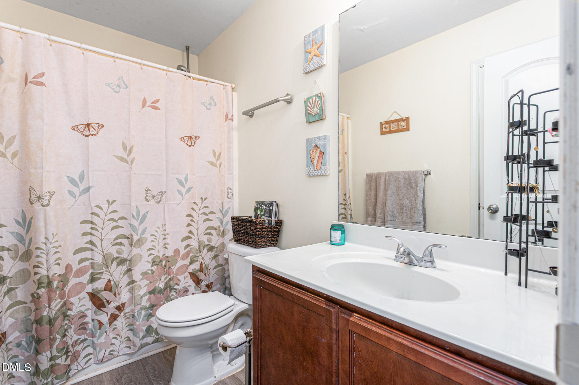 1985 Softwinds Drive Graham, NC 27253 - Photo 21 of 31 a bathroom with a sink toilet and shower