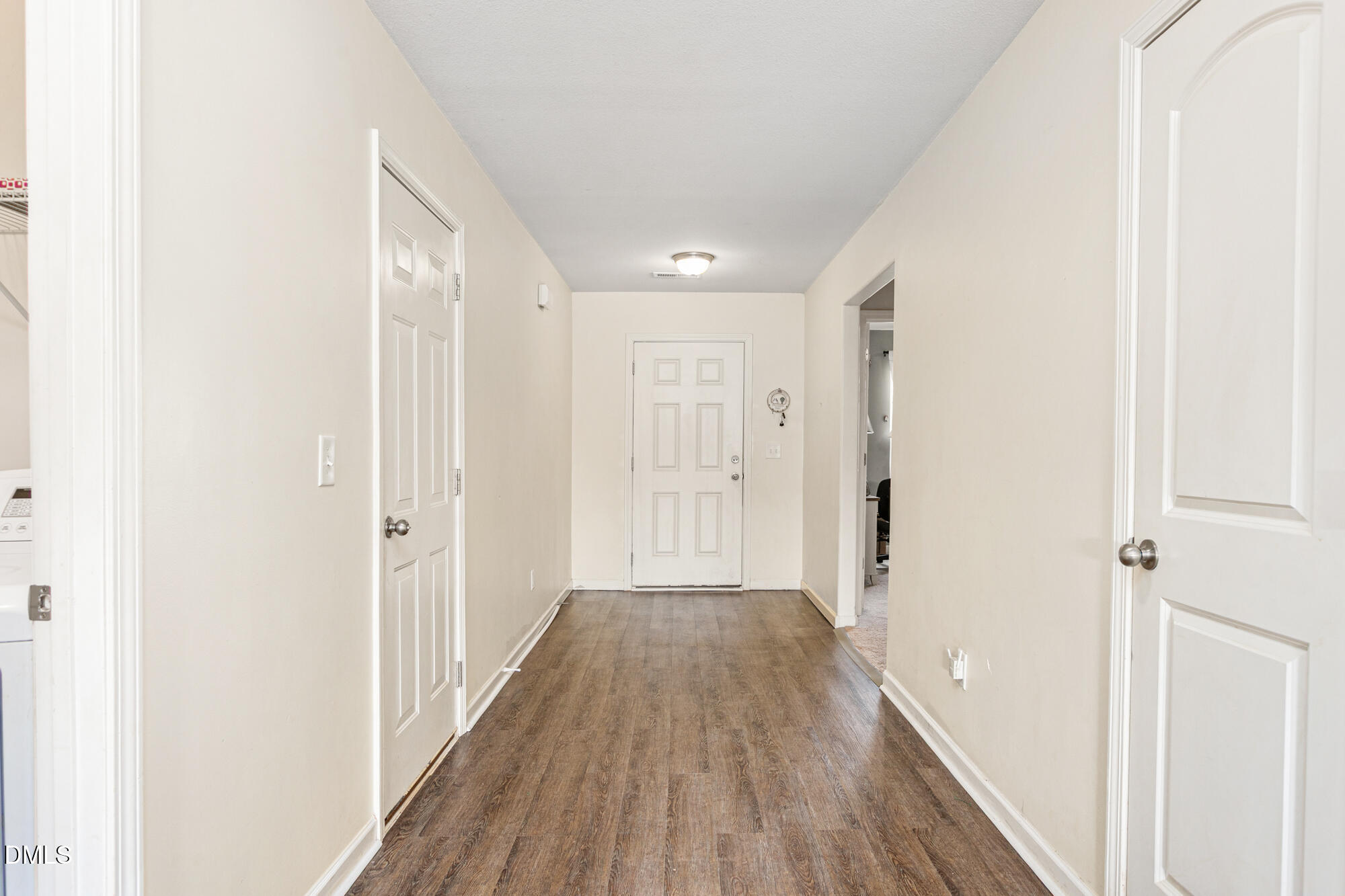 1985 Softwinds Drive Graham, NC 27253 - Photo 4 of 31 a view of a hallway with wooden floor
