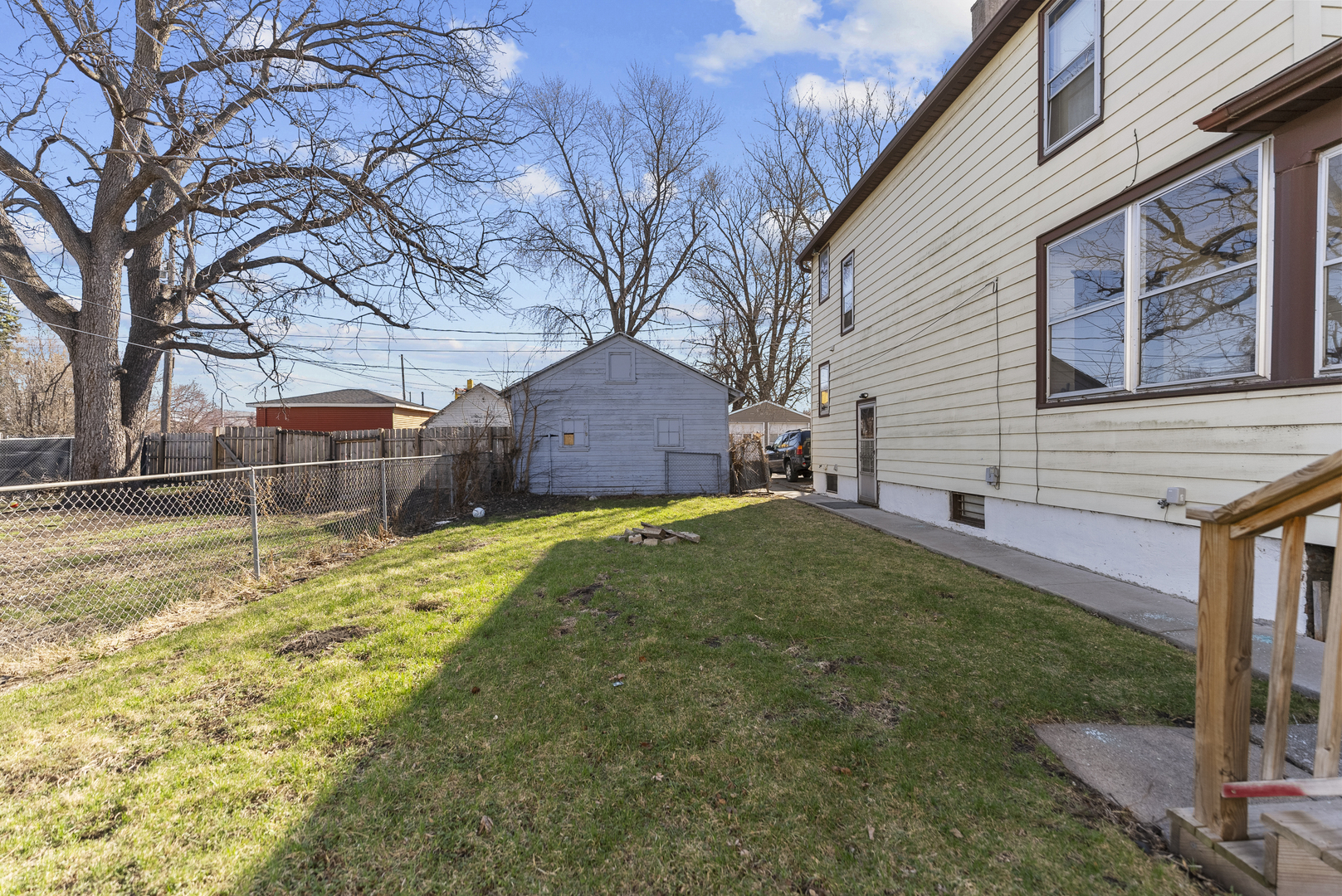 615 44th Street Rock Island, IL 61201 - Photo 20 of 22 a view of a house with a backyard