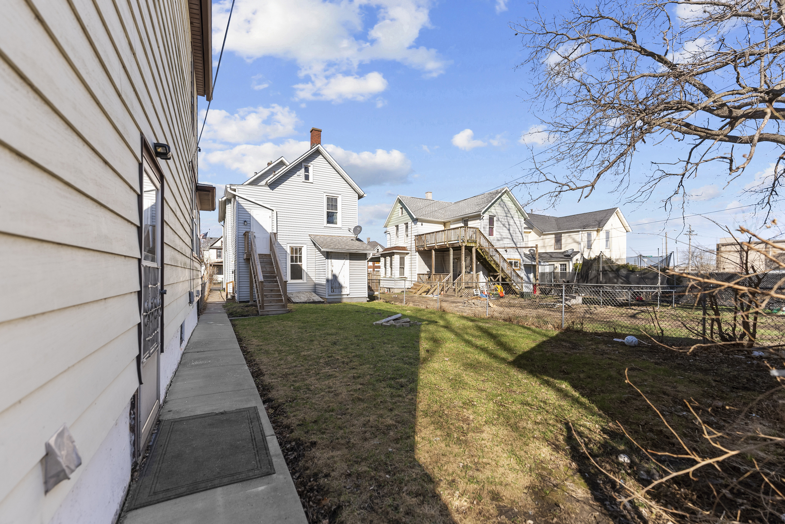 615 44th Street Rock Island, IL 61201 - Photo 21 of 22 a view of a house with a yard