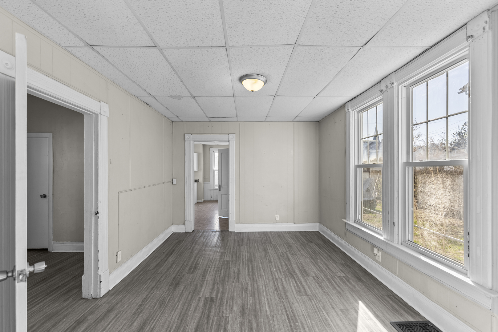615 44th Street Rock Island, IL 61201 - Photo 7 of 22 a view of a livingroom with wooden floor