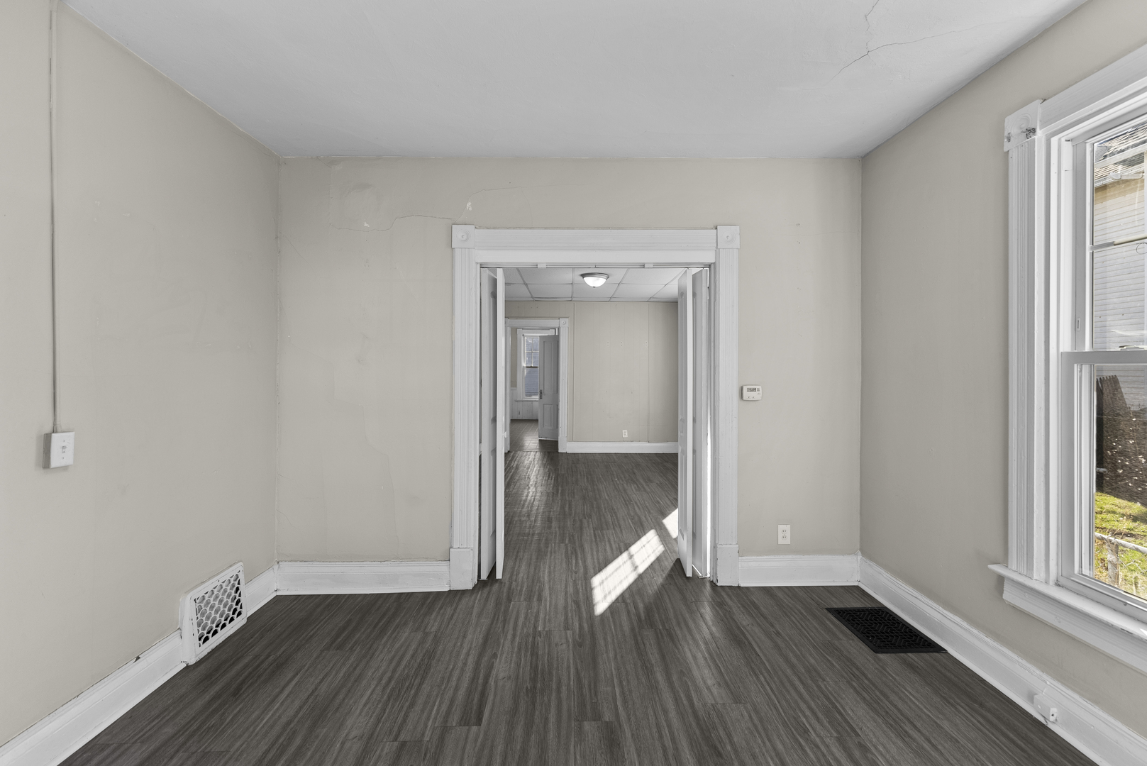 615 44th Street Rock Island, IL 61201 - Photo 9 of 22 wooden floor in an empty room