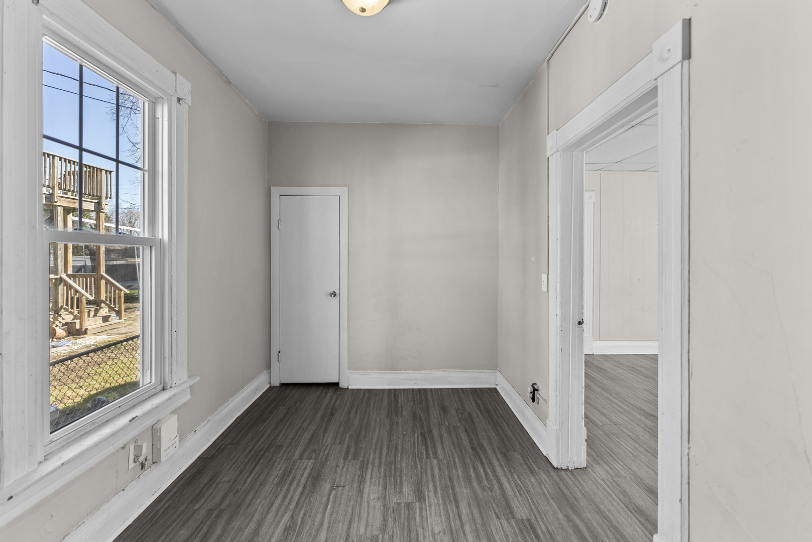 615 44th Street Rock Island, IL 61201 - Photo 10 of 22 a view of room with window and hardwood floor