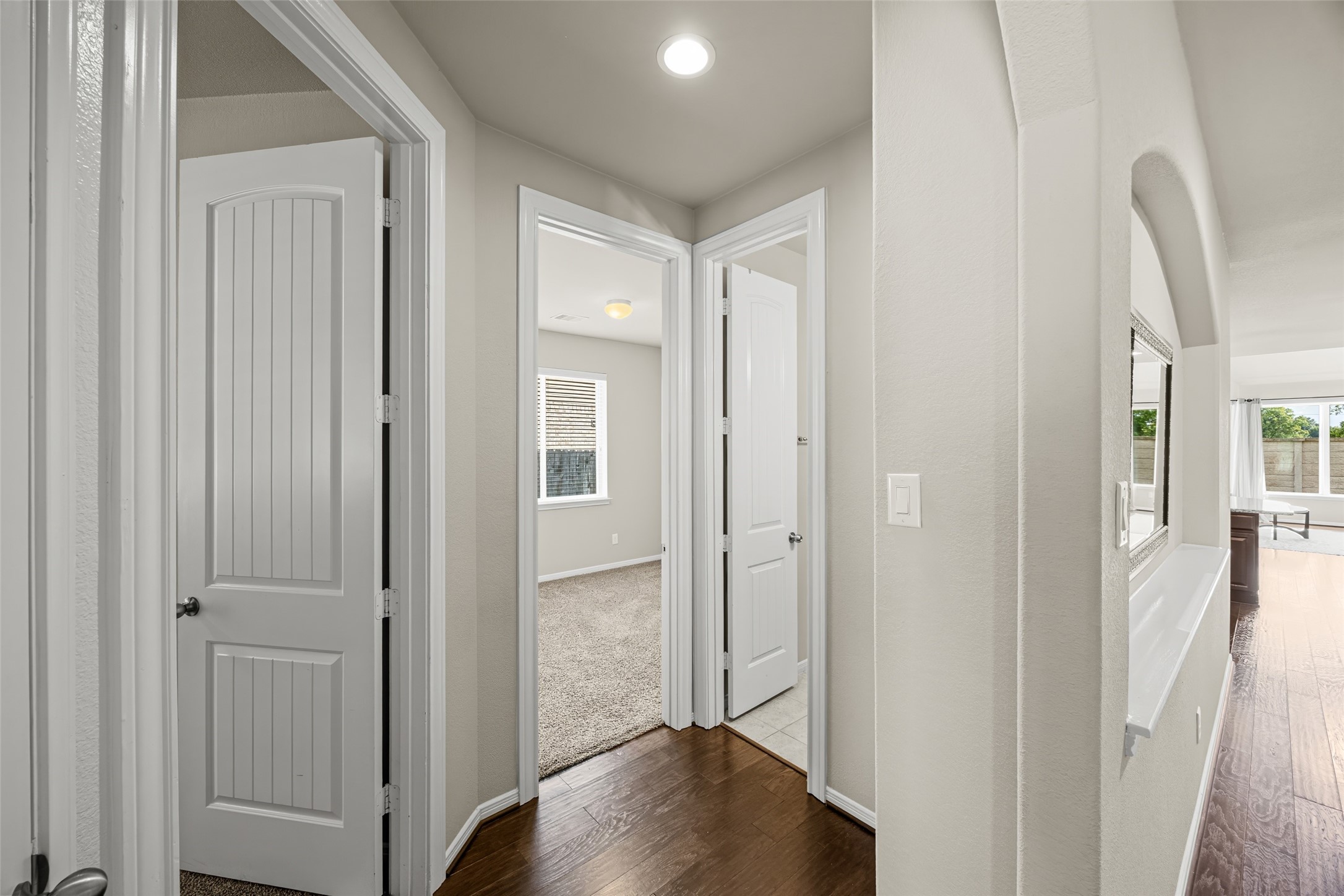 4438 Selwyn Road Richmond, TX 77407 - Photo 16 of 23 a view of a bathroom from a hallway