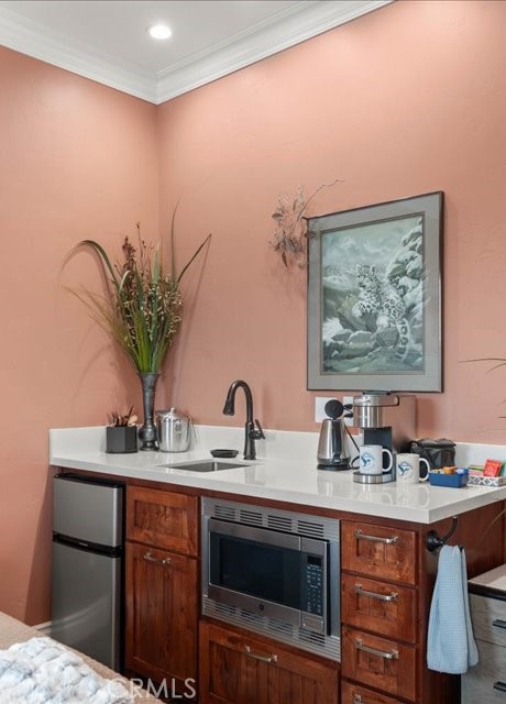 701 Rio Street Red Bluff, CA 96080 - Photo 51 of 73 a sink with a potted plant on a counter and a sink