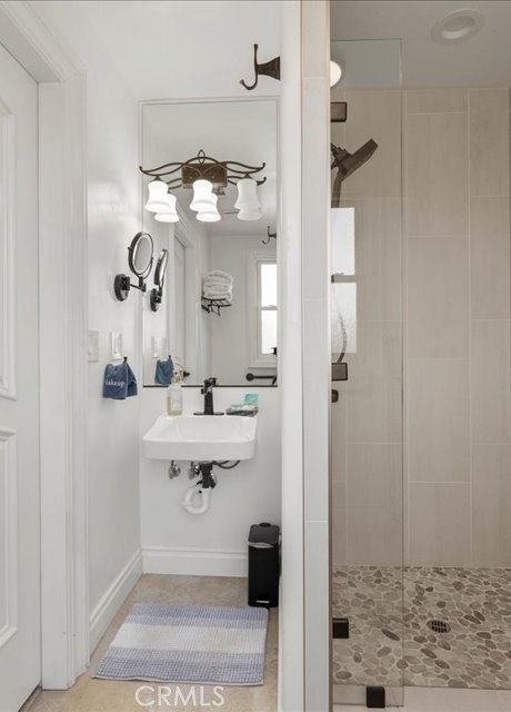 701 Rio Street Red Bluff, CA 96080 - Photo 54 of 73 a bathroom with a sink shower and a mirror