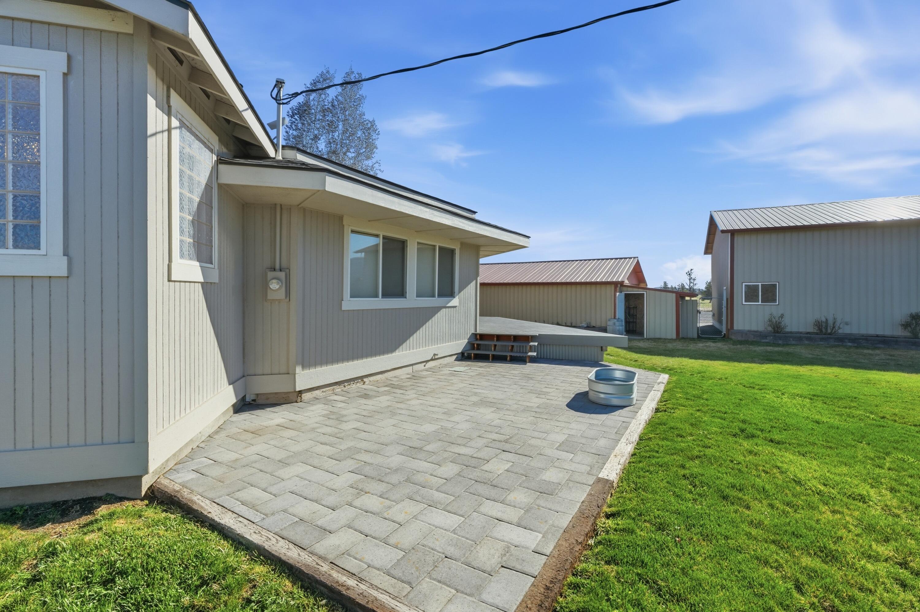 4074 Southwest Reif Road Powell Butte, OR 97753 - Photo 41 of 59 a house view with a backyard space