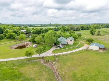 a view of a lake with a big yard